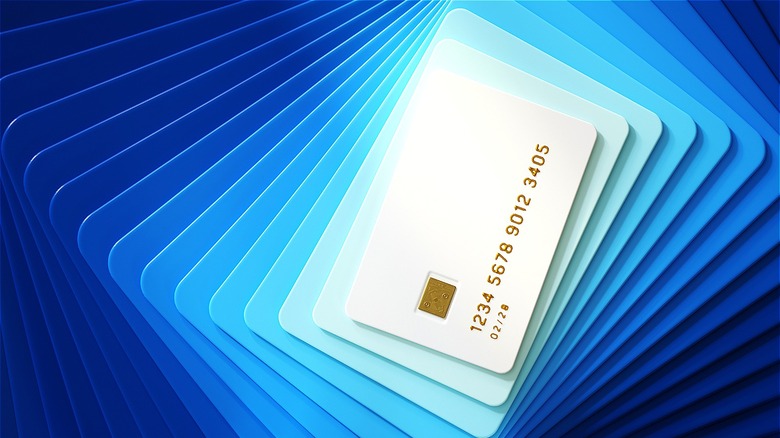 White credit card on blue card shaped background gradient