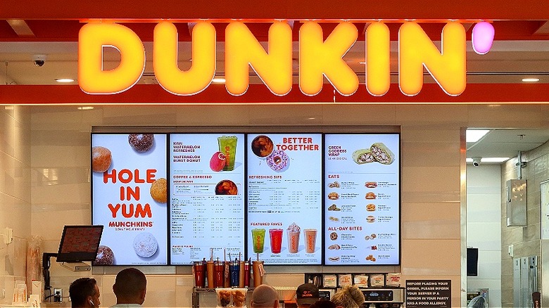 Dunkin' sign above menu