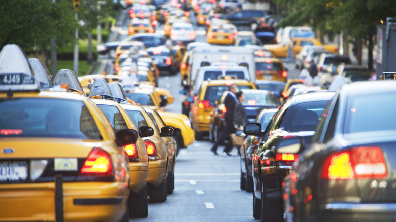 Vehicles stuck in traffic on a busy street