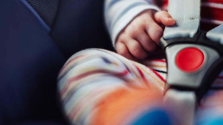 closeup of baby in car seat