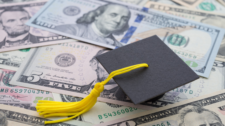 money and graduate cap