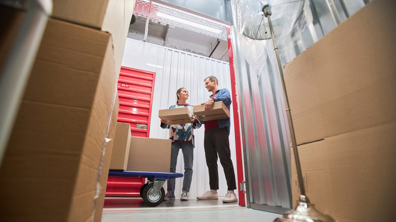 people at a self-storage unit