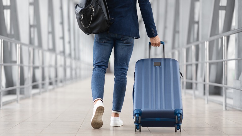 traveler walking in airport
