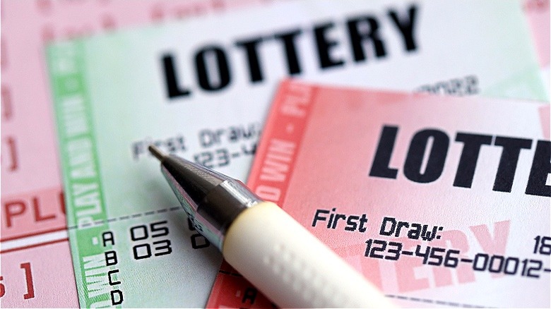 Lottery tickets and pencil close-up