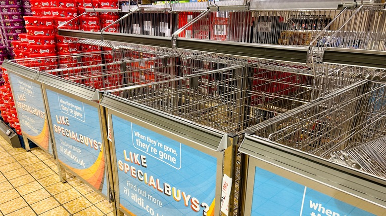 Empty grocery shelves in sale aisle