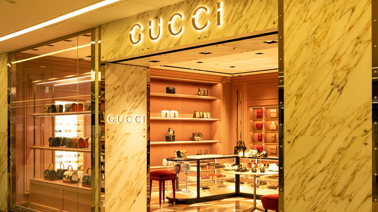 A golden Gucci storefront