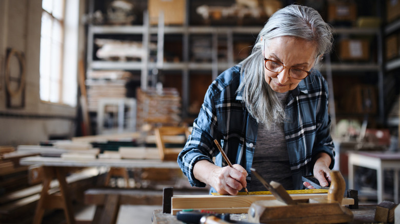 Older person working in workshop