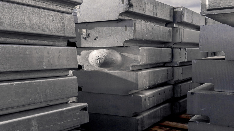 Towering stacks of aluminum blanks.