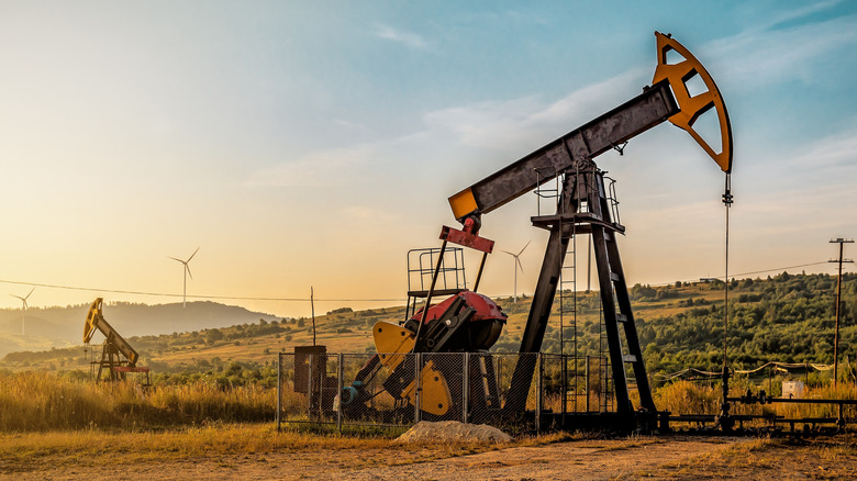 Crude oil machinery at work in an oil field.