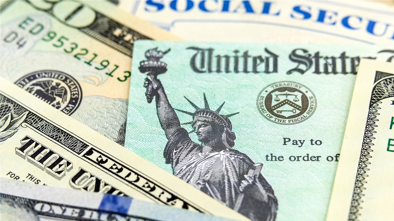 Social Security card among $1s