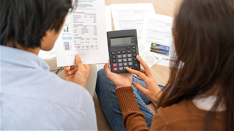Couple reviewing credit card statement