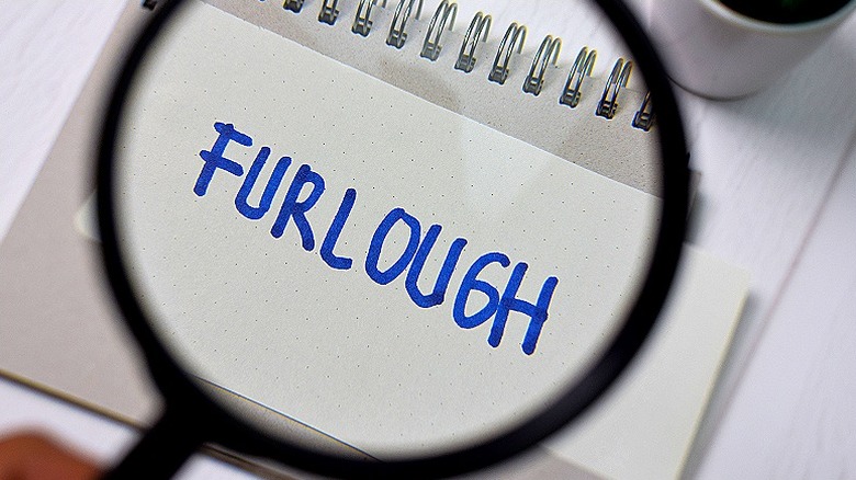 the word furlough being magnified