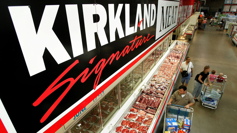 A birds-eye view of a Costco meat section, featuring cuts of beef for sale.