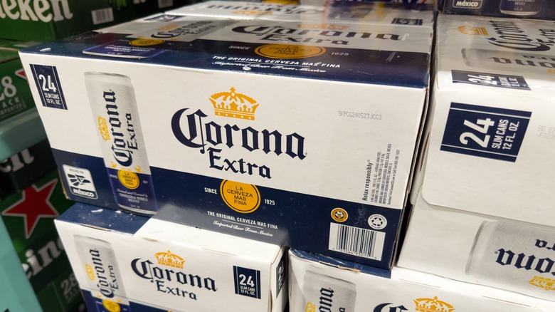 A pallet of Corona extra under the fluorescent lights of Costco.