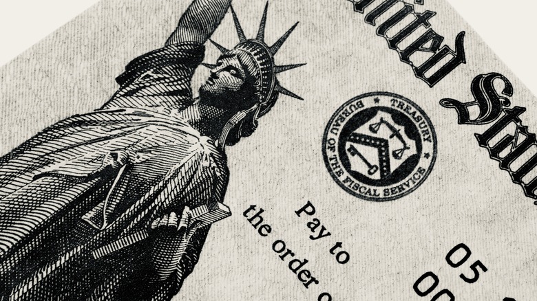 A black-and-white rendering of Lady Liberty on a Social Security check.