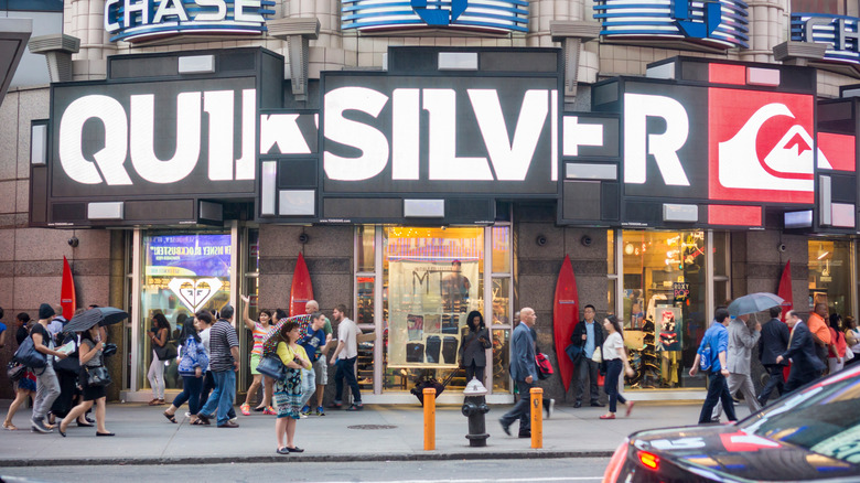 Times Square sign displaying Quicksilver logo above storefront