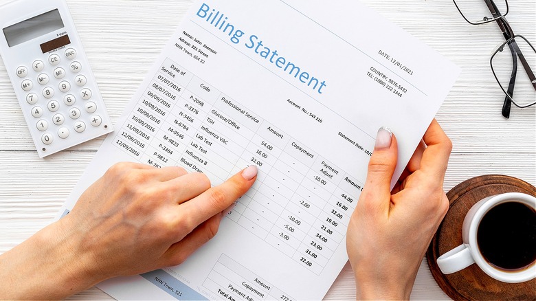 Person going over billing statement