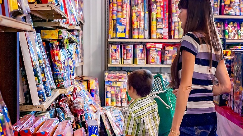 Mother and son fireworks shopping