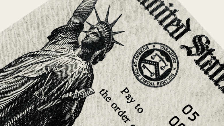 A black-and-white rendition of Lady Liberty on a Social Security check.