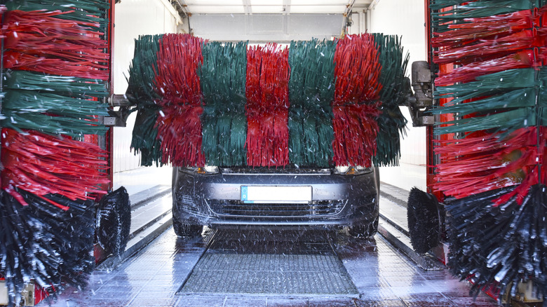 A car undergoing an automatic car wash