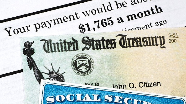 Social Security statement, U.S. Treasury check, and Social Security card