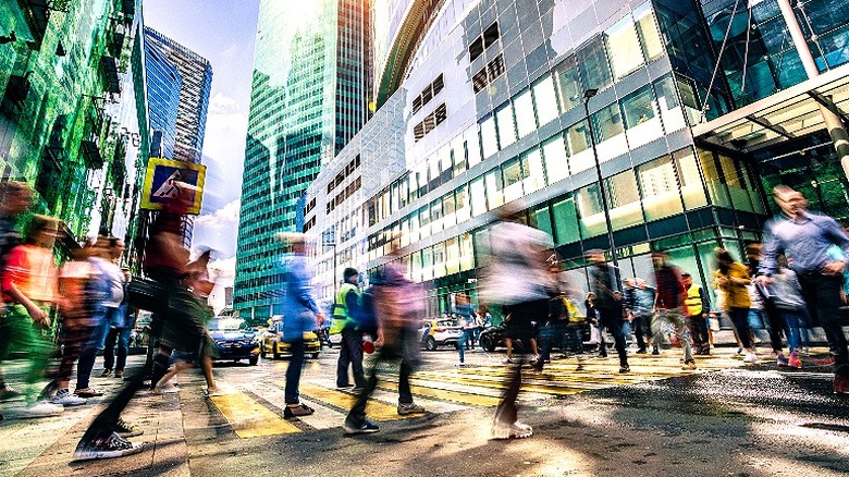 People in a blur walking in Manhattan in the daytime