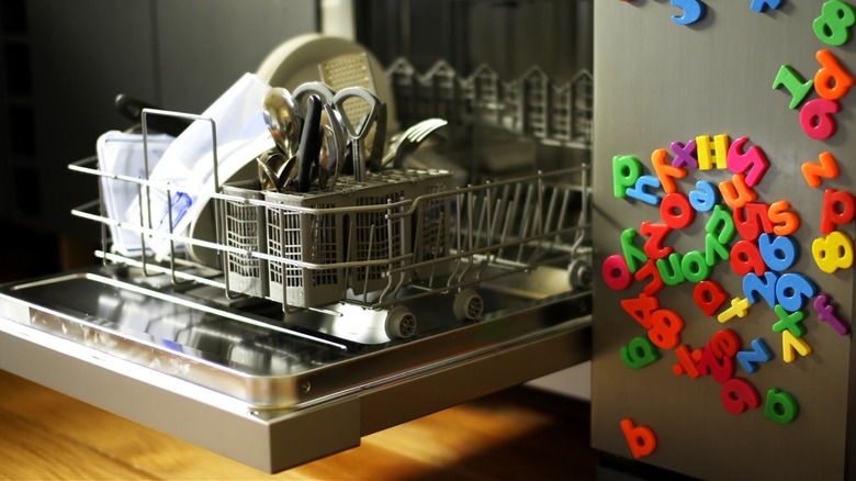 Door open to laded dishwasher