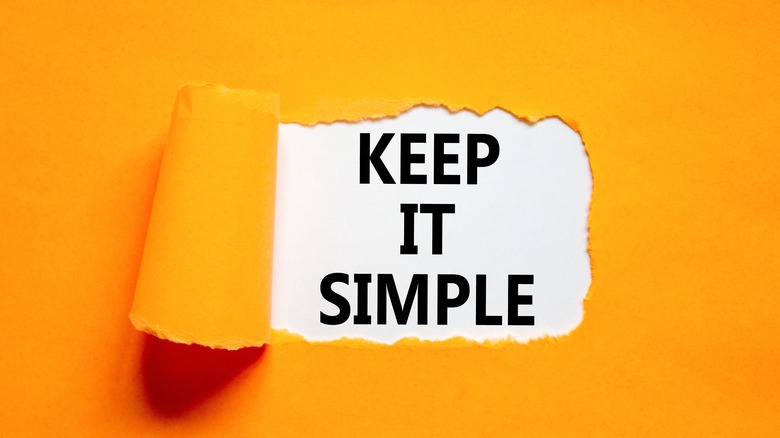 keep it simple note behind orange paper