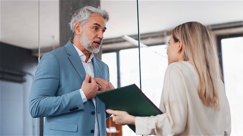 Boss talking to worker