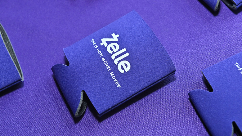 Purple koozies featuring Zelle logo.