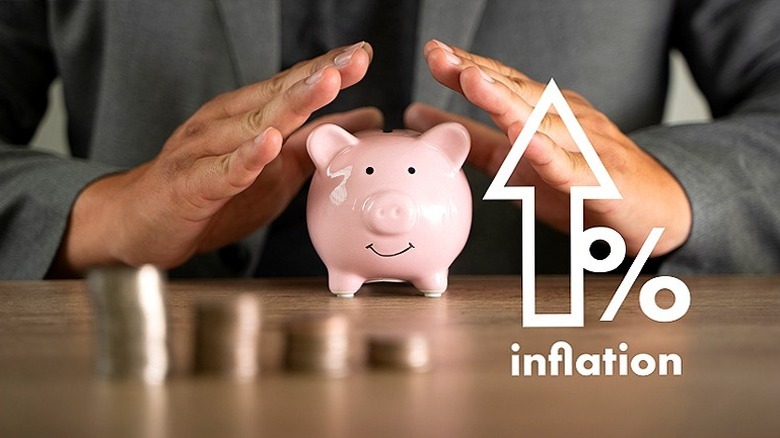 Piggy bank with inflation symbol