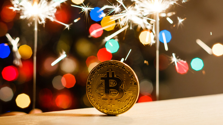 bitcoin coin with party sparklers