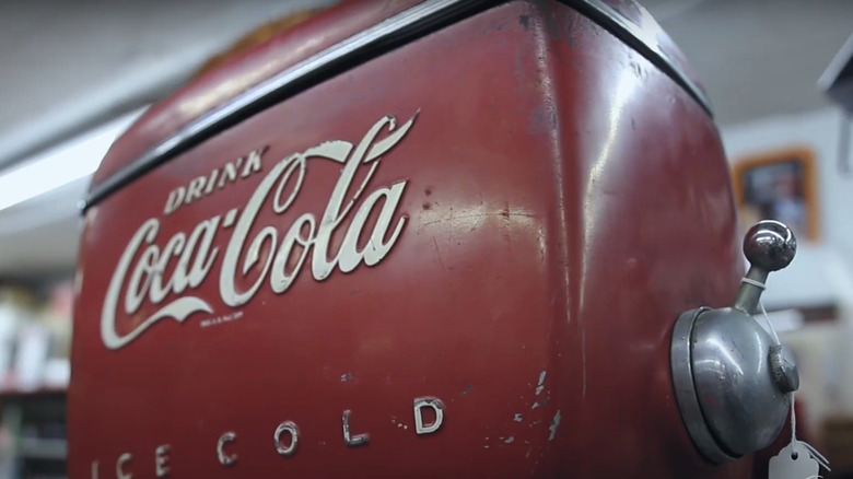 an old Coca-Cola cooler