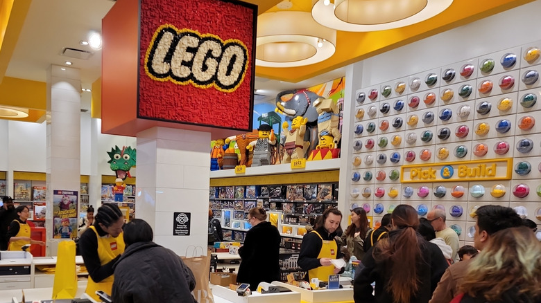 A LEGO store packed with people