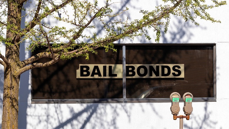 Window with "Bail Bonds" sign