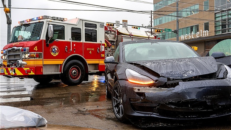 Fire truck and crashed Tesla