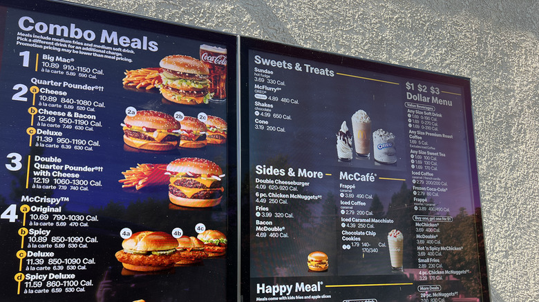 Close-up of McDonald's drive-thru menu board displaying combo meals