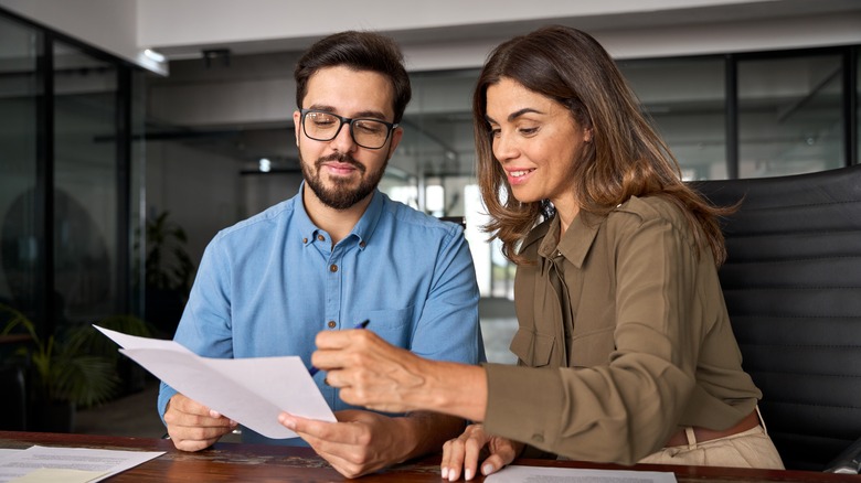 Financial advisor speaking with a man