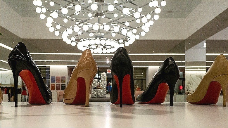 Louboutin high heels on display