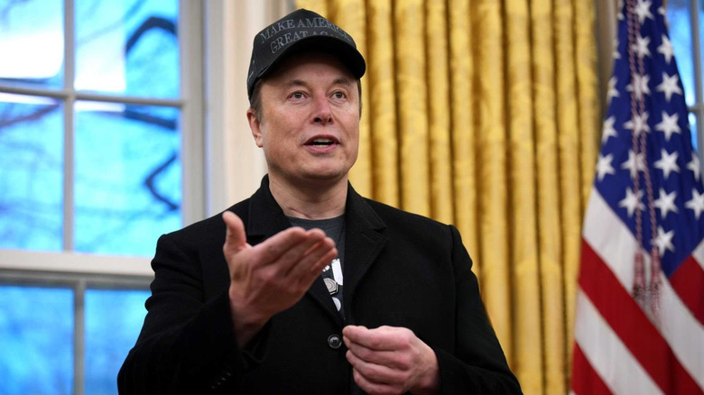 Elon Musk at a press conference in the Oval Office