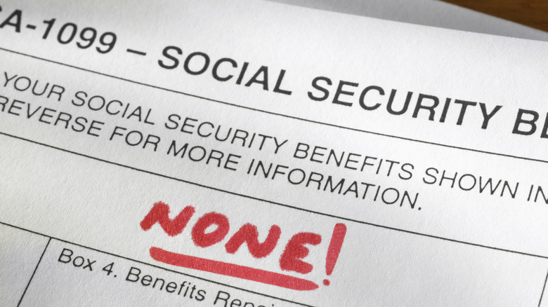 A Social Security form with writing in red ink