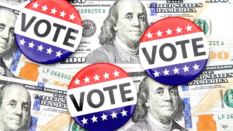 Vote pins and $100 bills