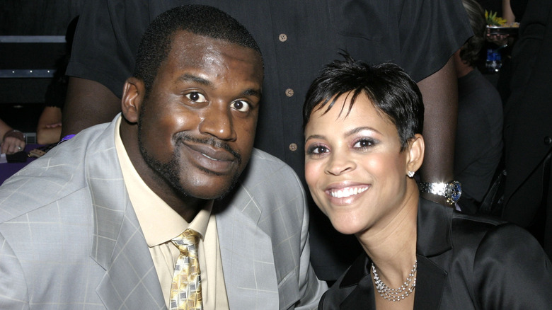 Shaquille and Shaunie O'Neal smiling