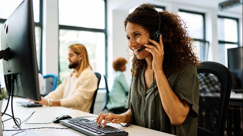 Smiling call center worker