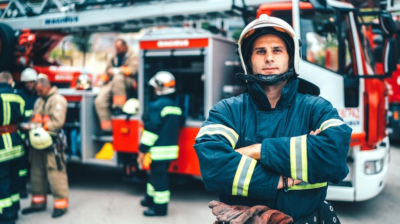 Firefighter looks at camera