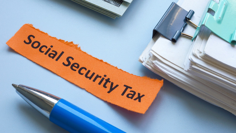 slip of paper reading "social security tax"