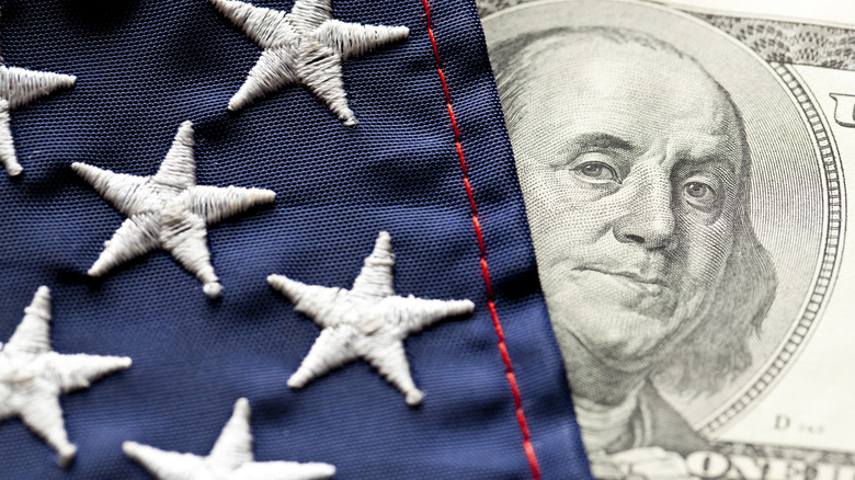 Close up of U.S. flag and money