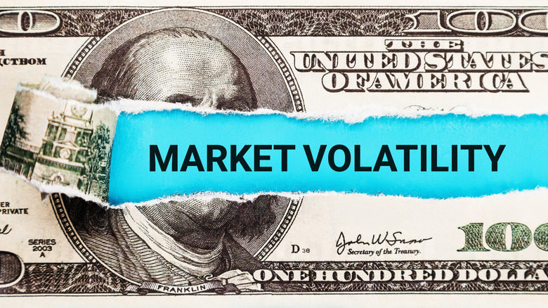 $100 bill with the words market volatility