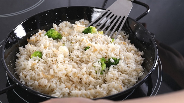 Homemade seasoned rice in skillet