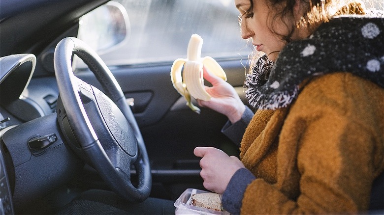 Eating banana in the car